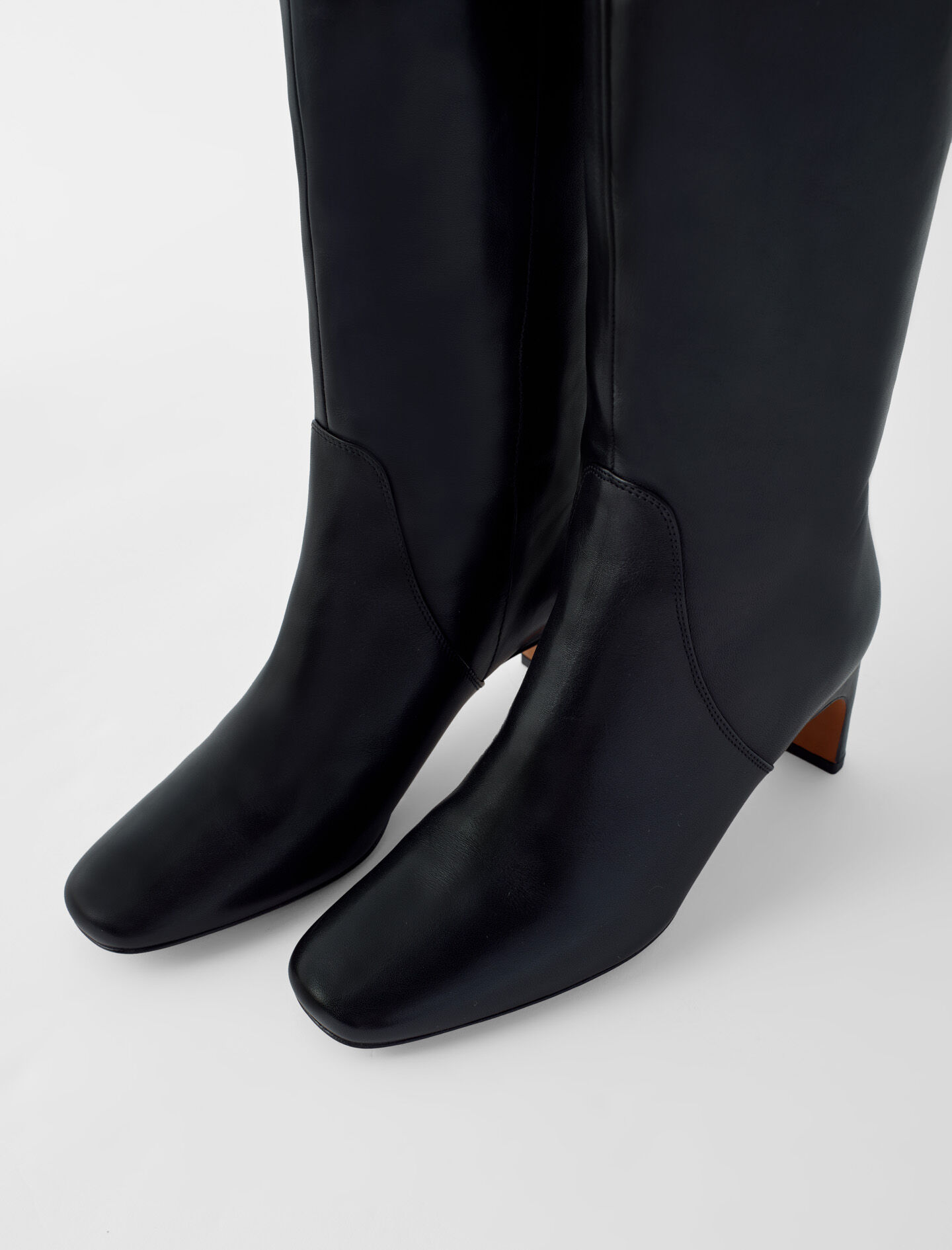 black leather mid heel boots
