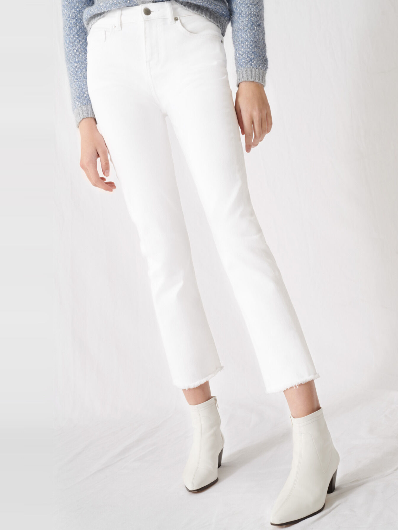 white cut jeans