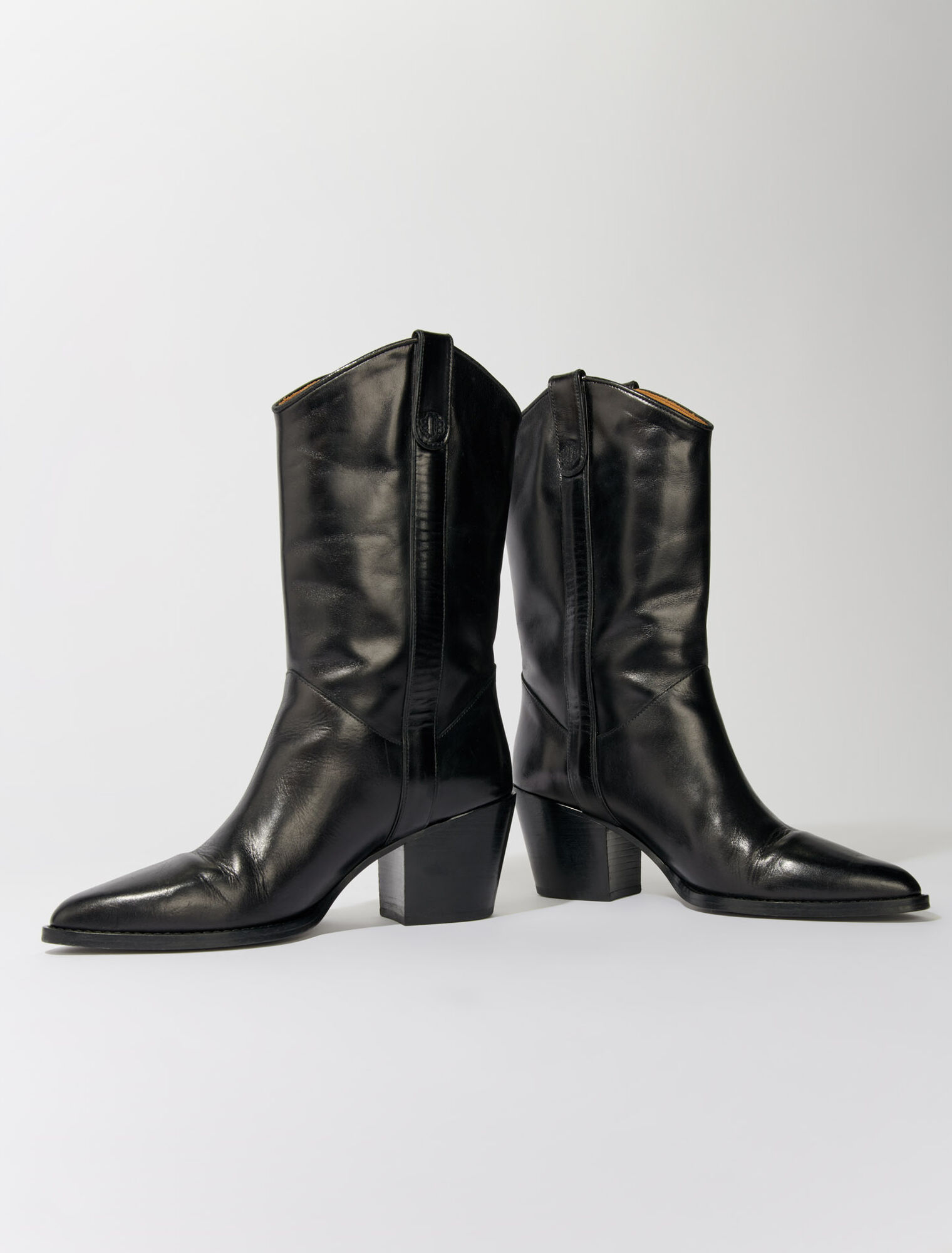 Heeled leather boots