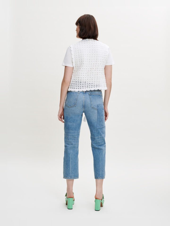 Small sleeveless jacket in guipure