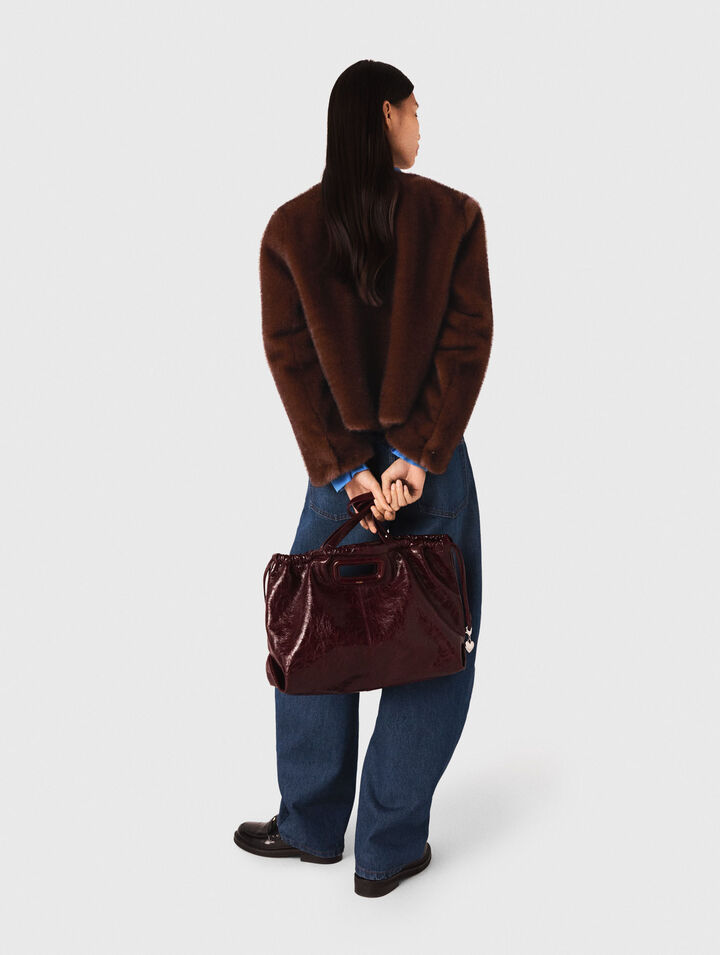 Manteau court en fausse fourrure