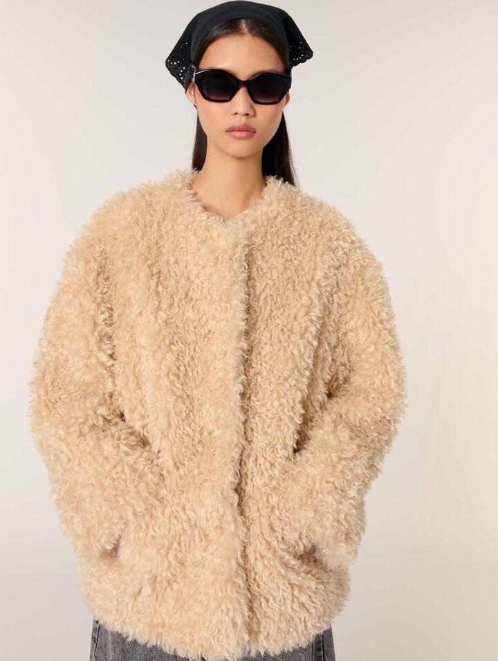 Manteau court en fausse fourrure