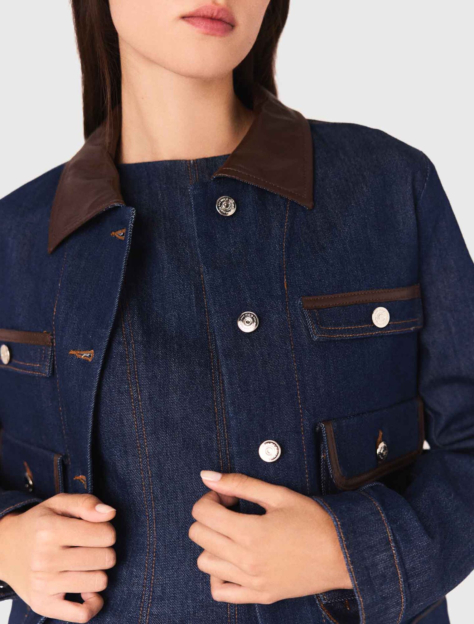 Veste en denim et col en faux cuir
