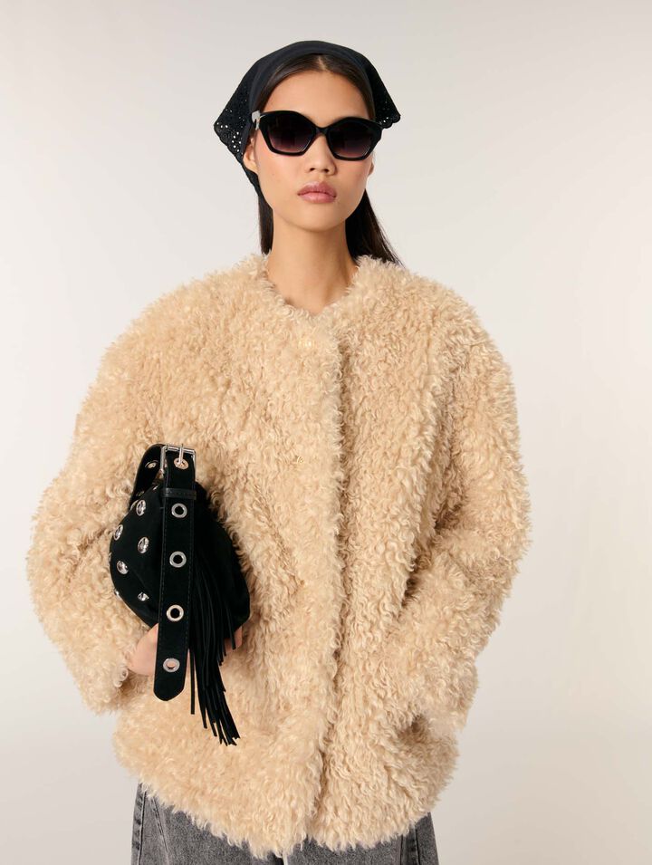 Manteau court en fausse fourrure