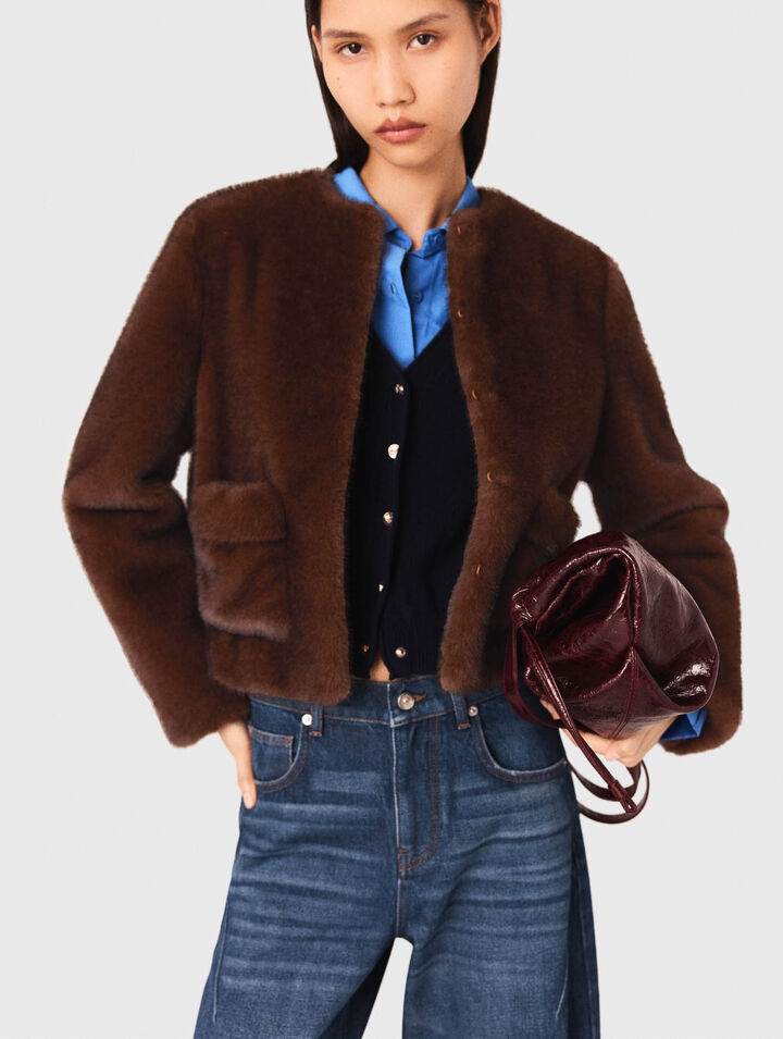 Manteau court en fausse fourrure