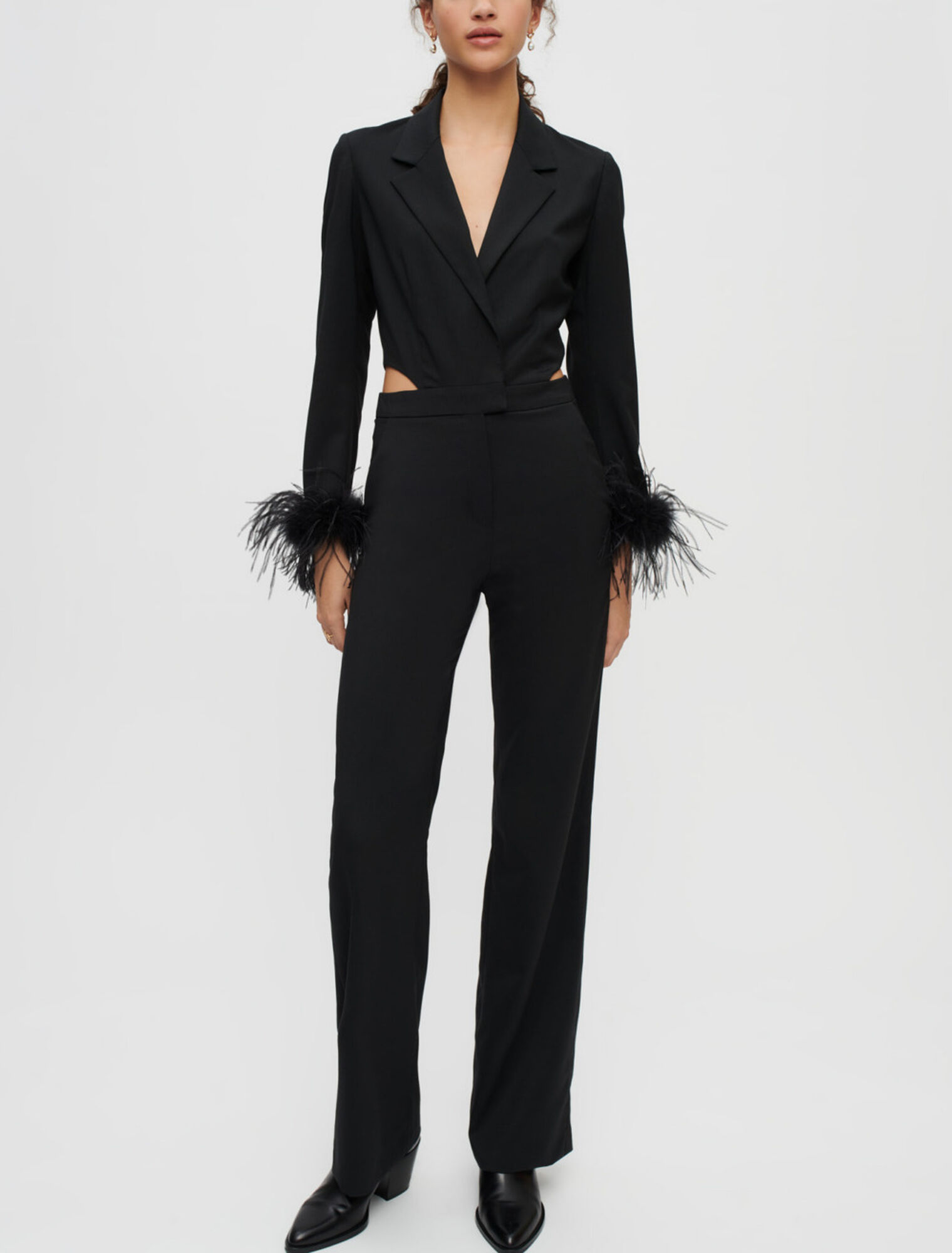 Combination pants in black with feathers