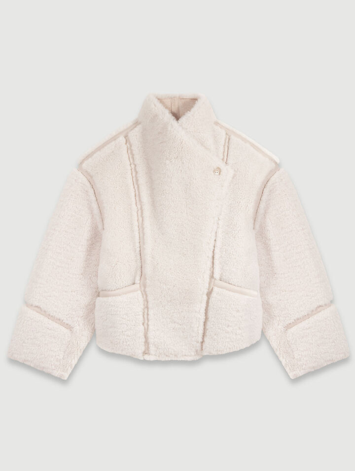 Manteau court en fausse fourrure