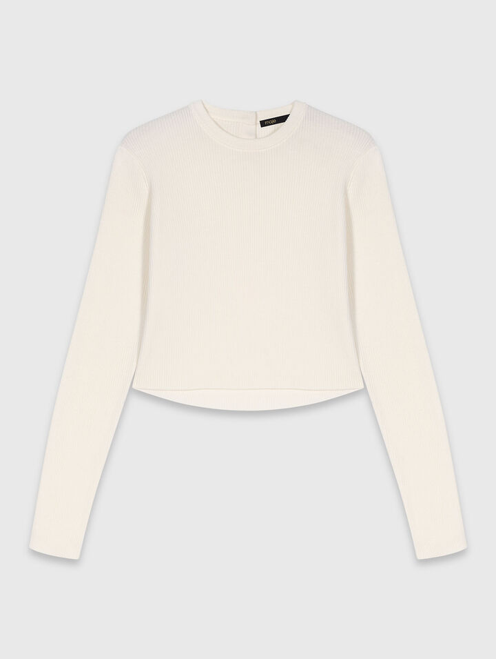 Pull avec boutons bijoux sur le dos