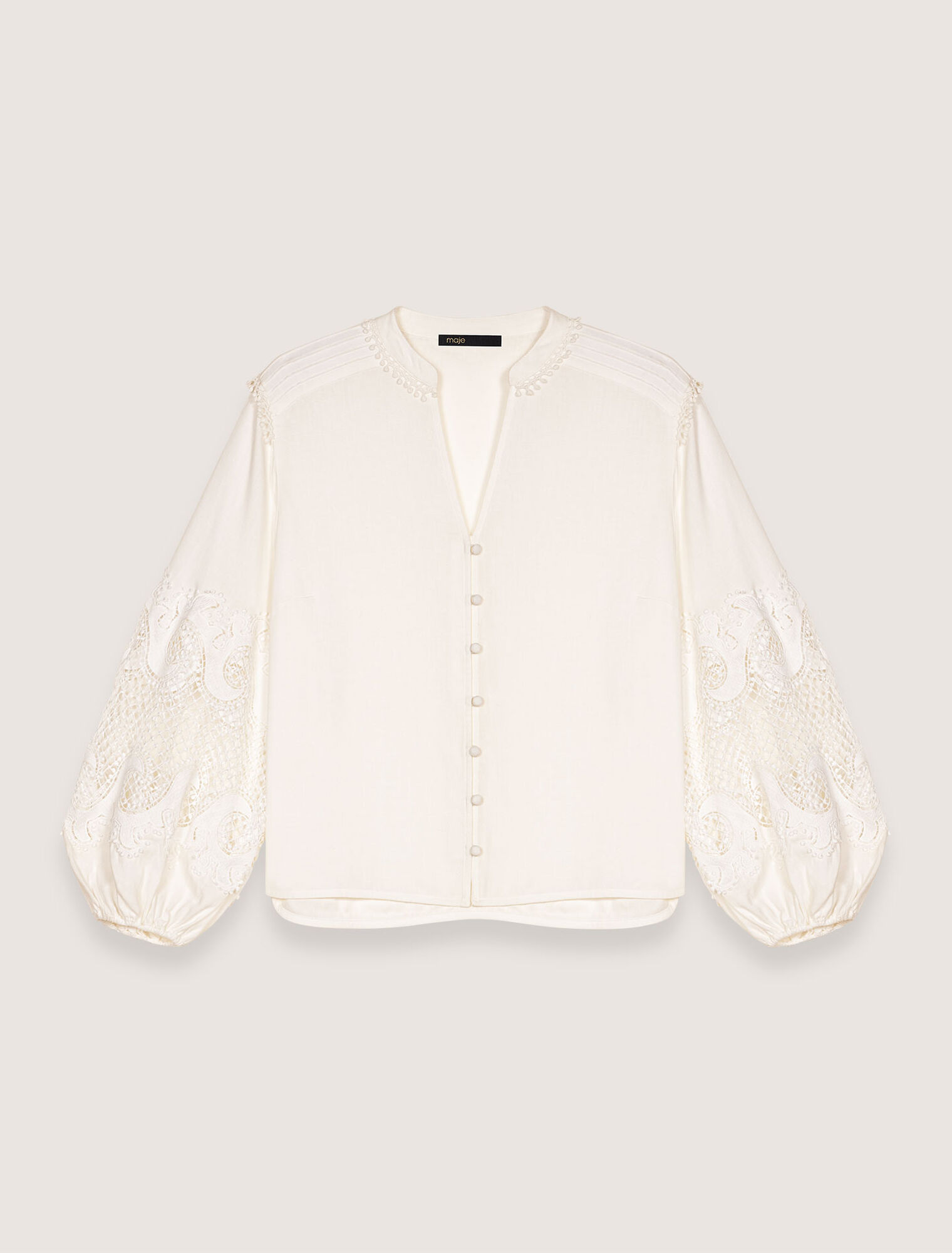 Shirt with embroidered sleeves