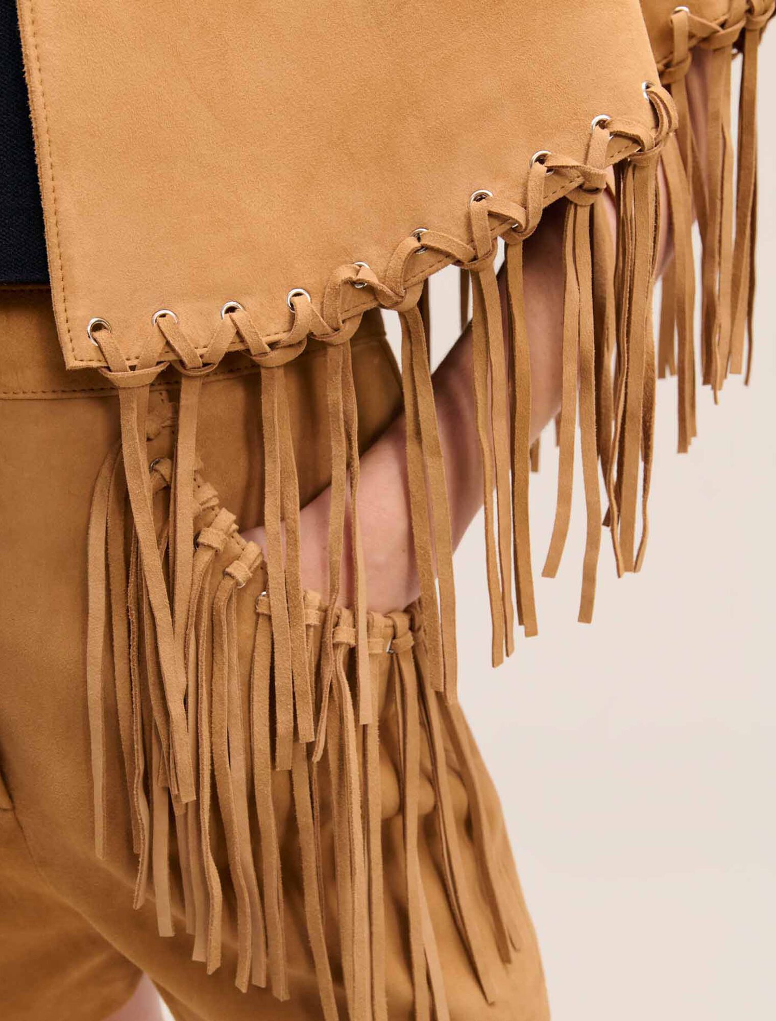 Manteau court à franges en nubuck