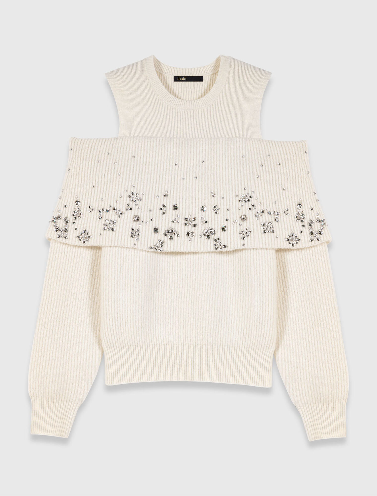 Pull épaules dénudées avec bijoux