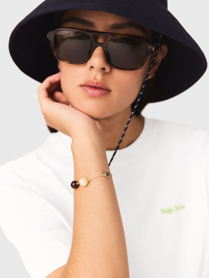 Bracelet &agrave; d&eacute;tails perles et strass