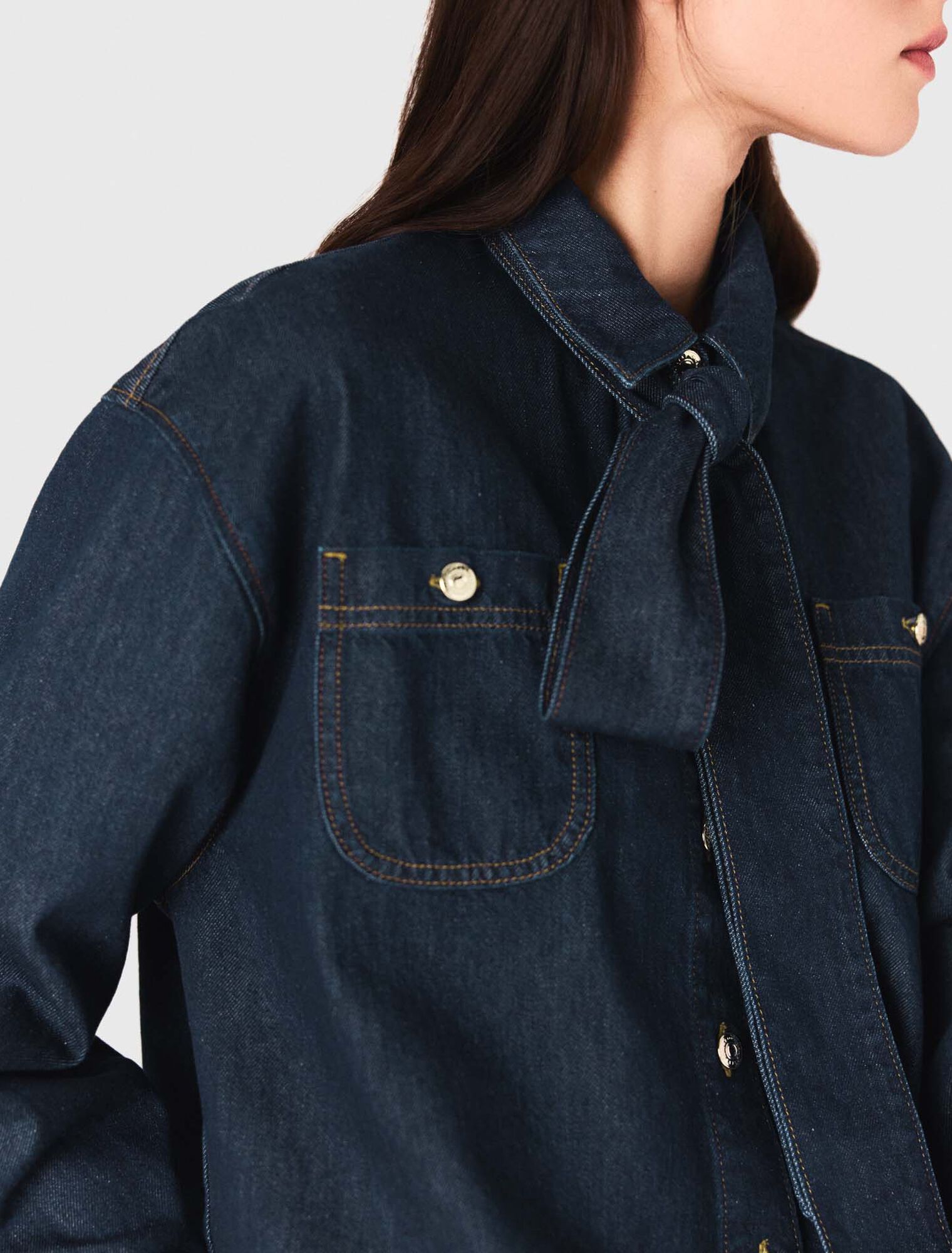 Denim shirt with pussy bow