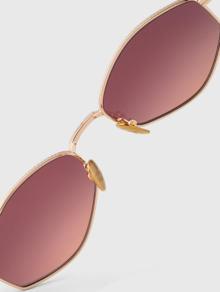 Lunettes ovales facett&eacute;es en m&eacute;tal