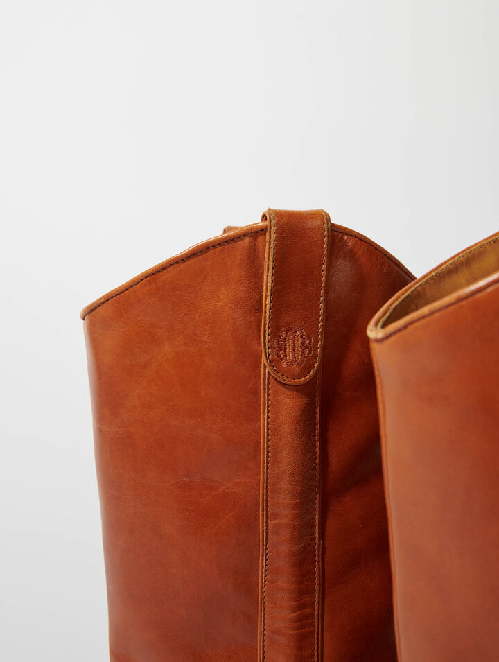 Heeled leather boots