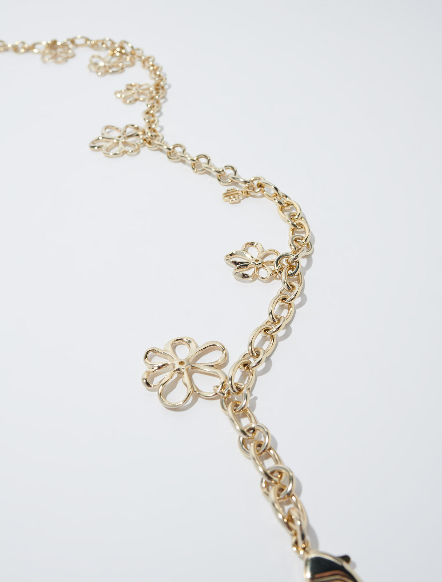 Ceinture chaîne ornée de fleurs