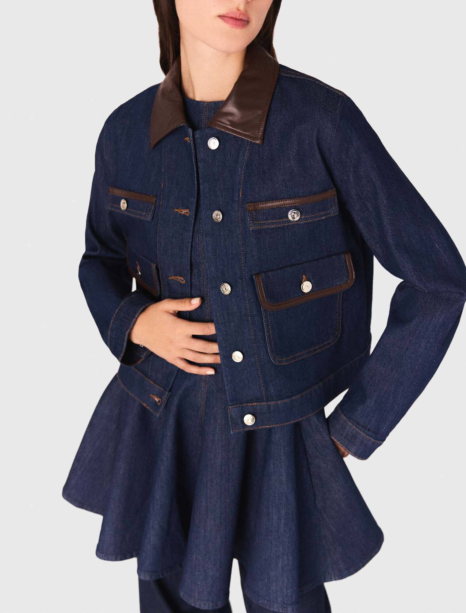 Veste en denim et col en faux cuir