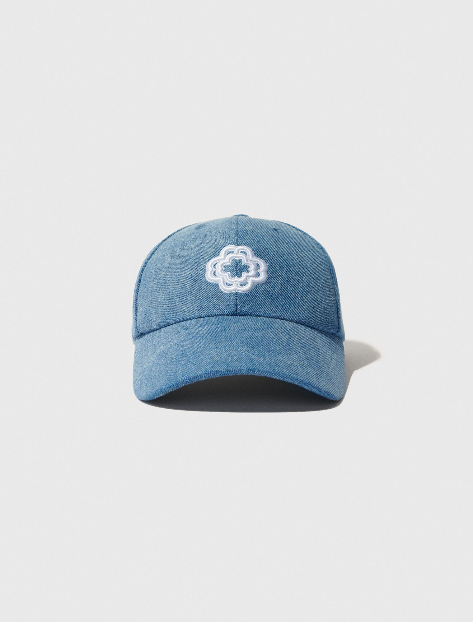 Denim cap with clover logo