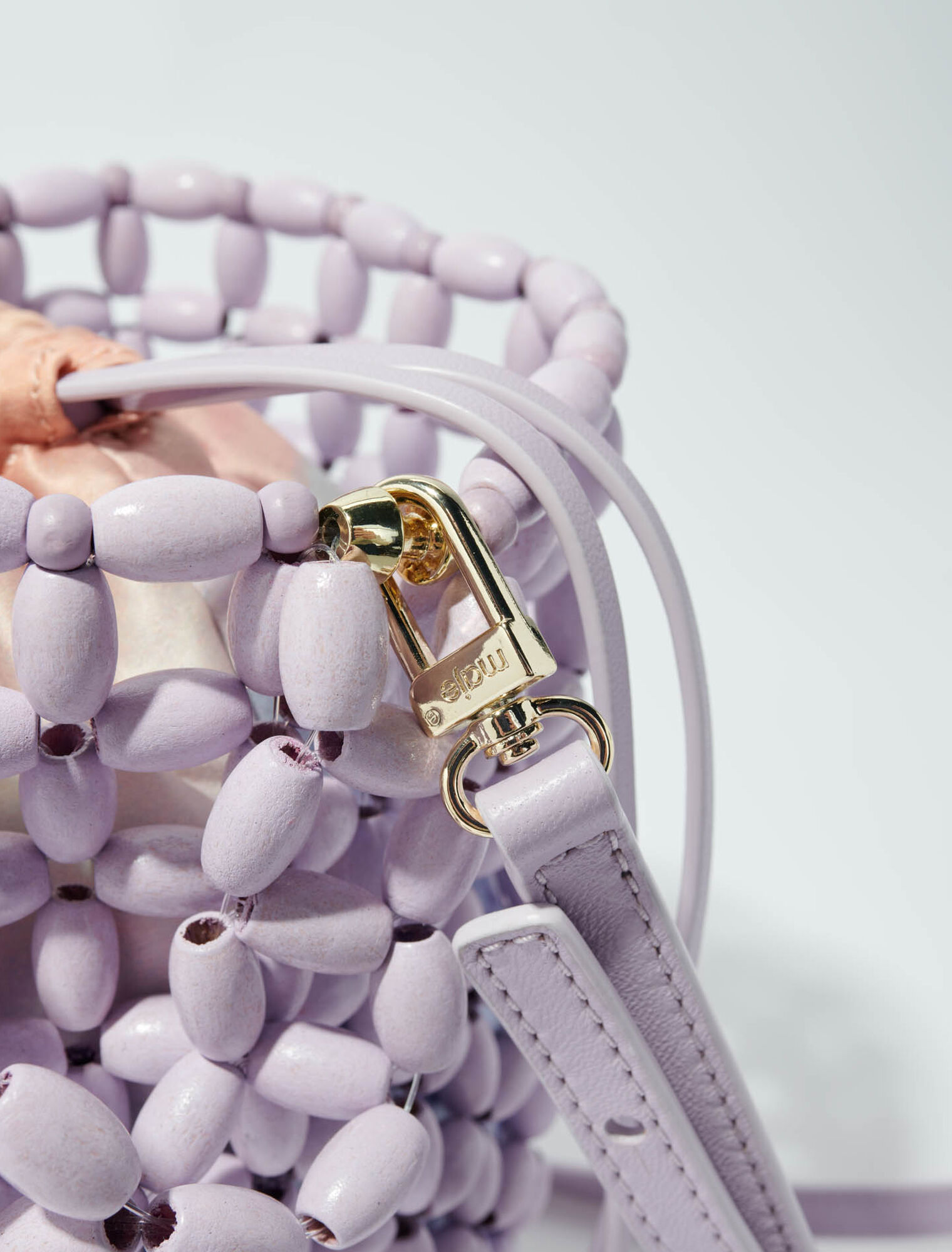 Bucket bag embellished with beads
