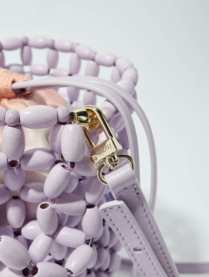 Bucket bag embellished with beads