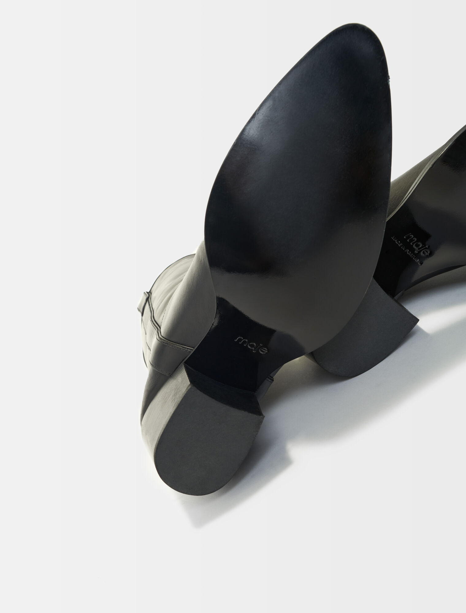 Heeled leather boots