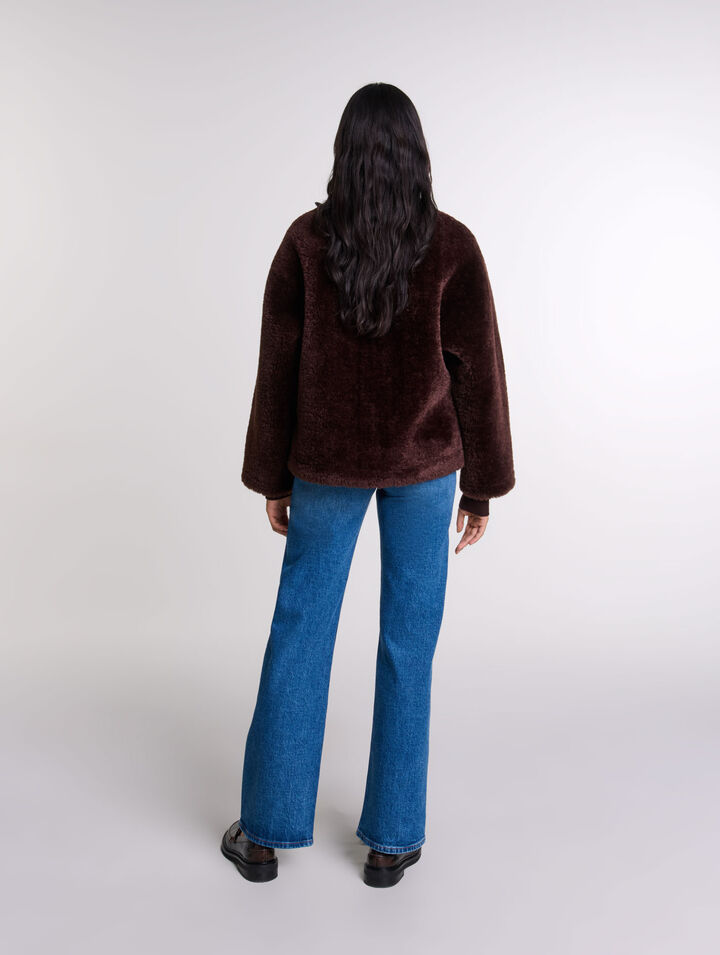 Manteau court en fausse fourrure