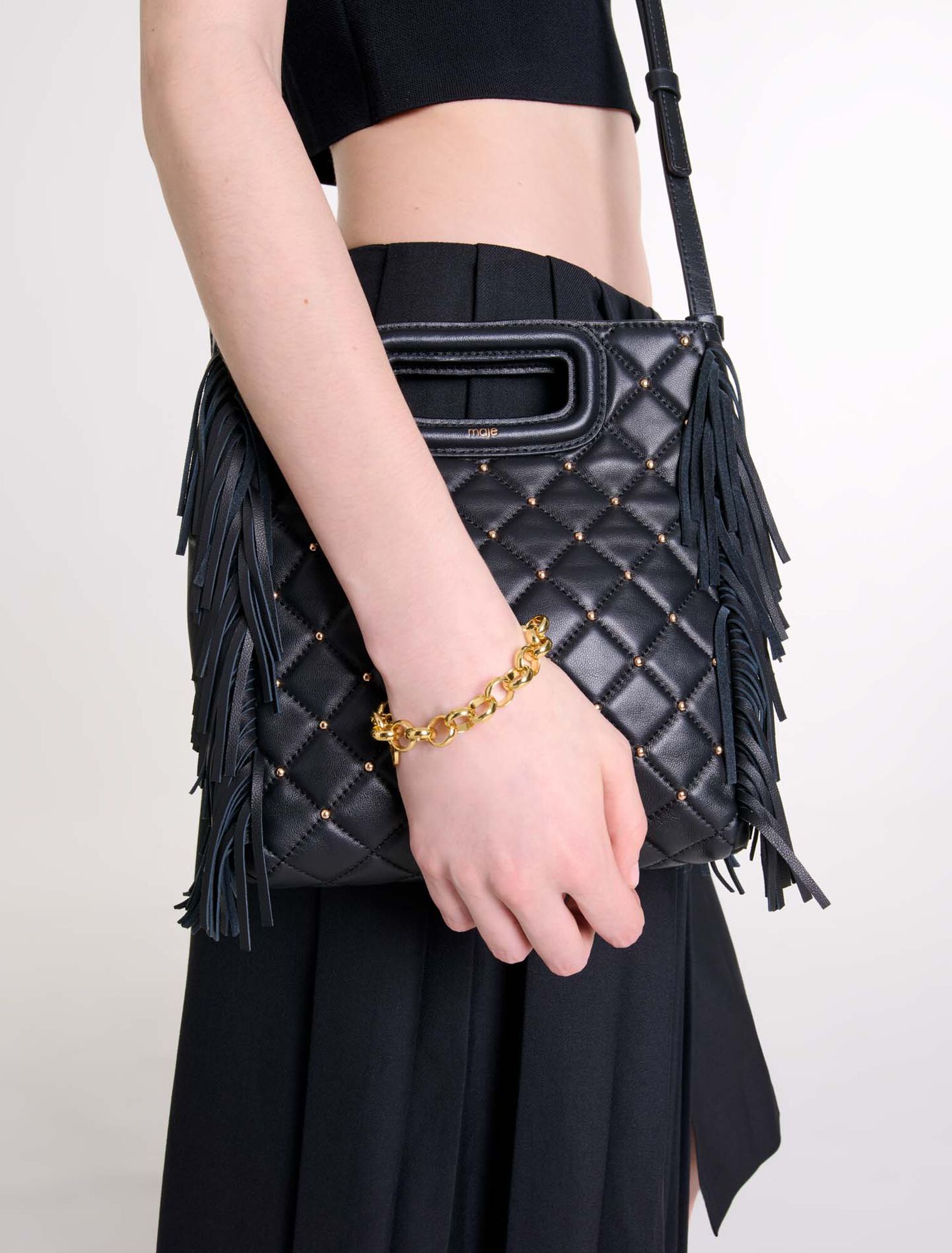 Sac M en cuir matelassé à studs