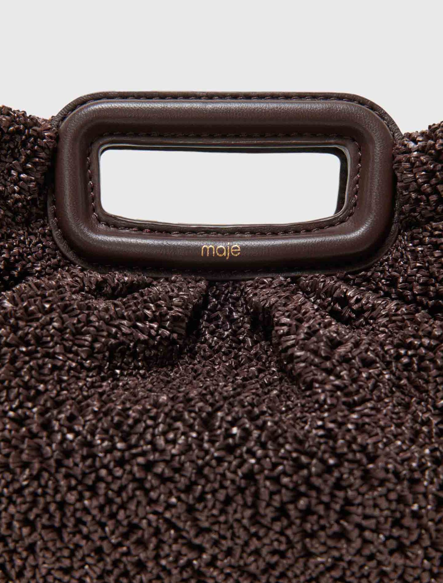 Mipli boucl&eacute; effect clutch bag