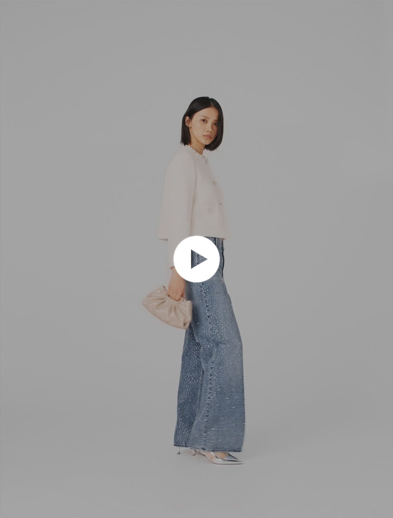 Pearl-trimmed tweed jacket