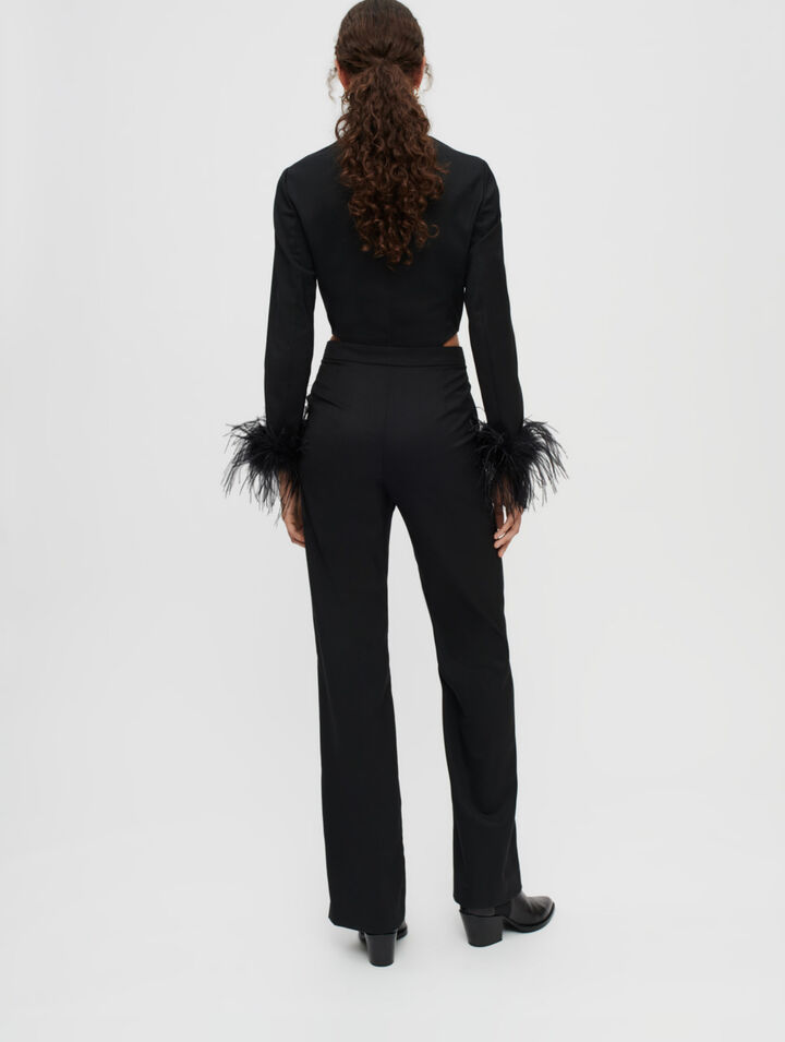 Combination pants in black with feathers
