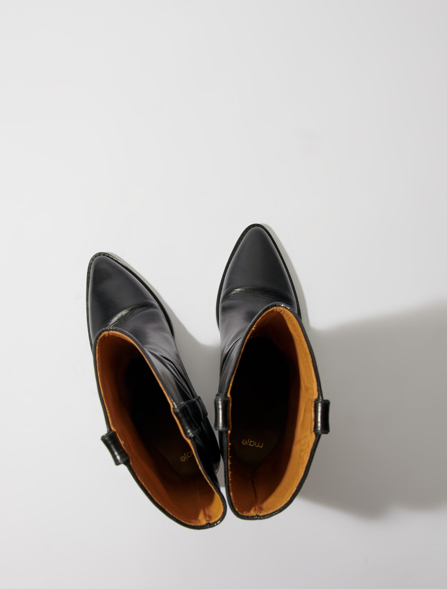 Heeled leather boots