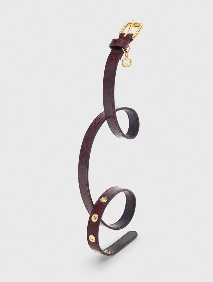Ceinture fine en cuir &agrave; &oelig;illets