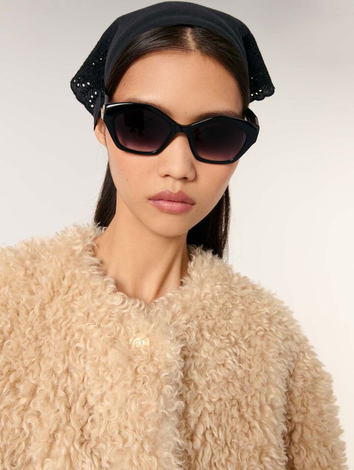 Manteau court en fausse fourrure