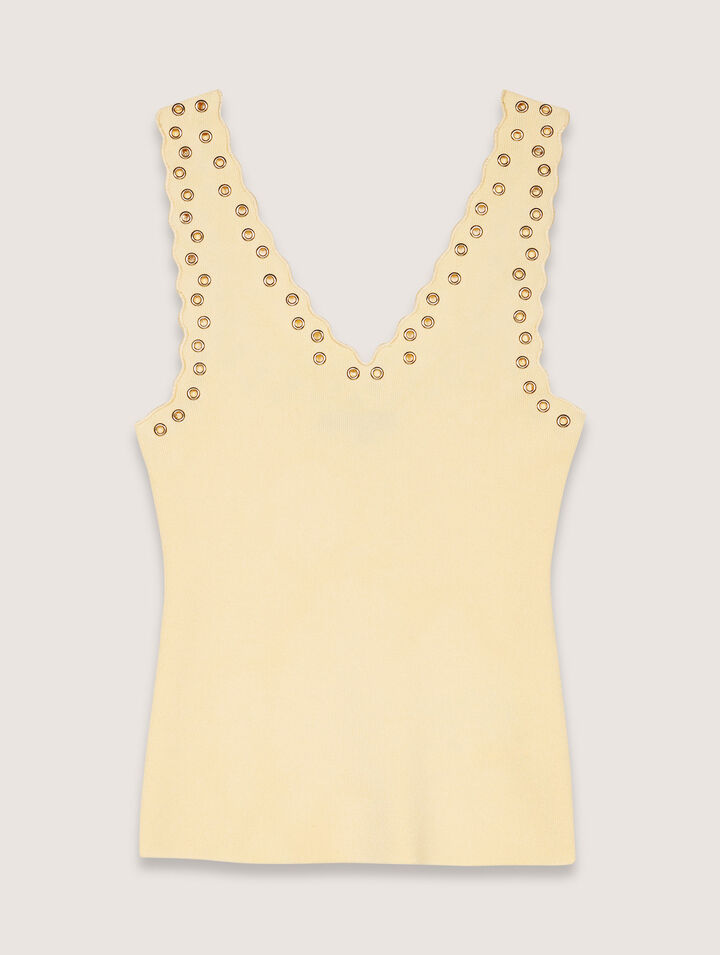 Top en maille &agrave; &oelig;illets