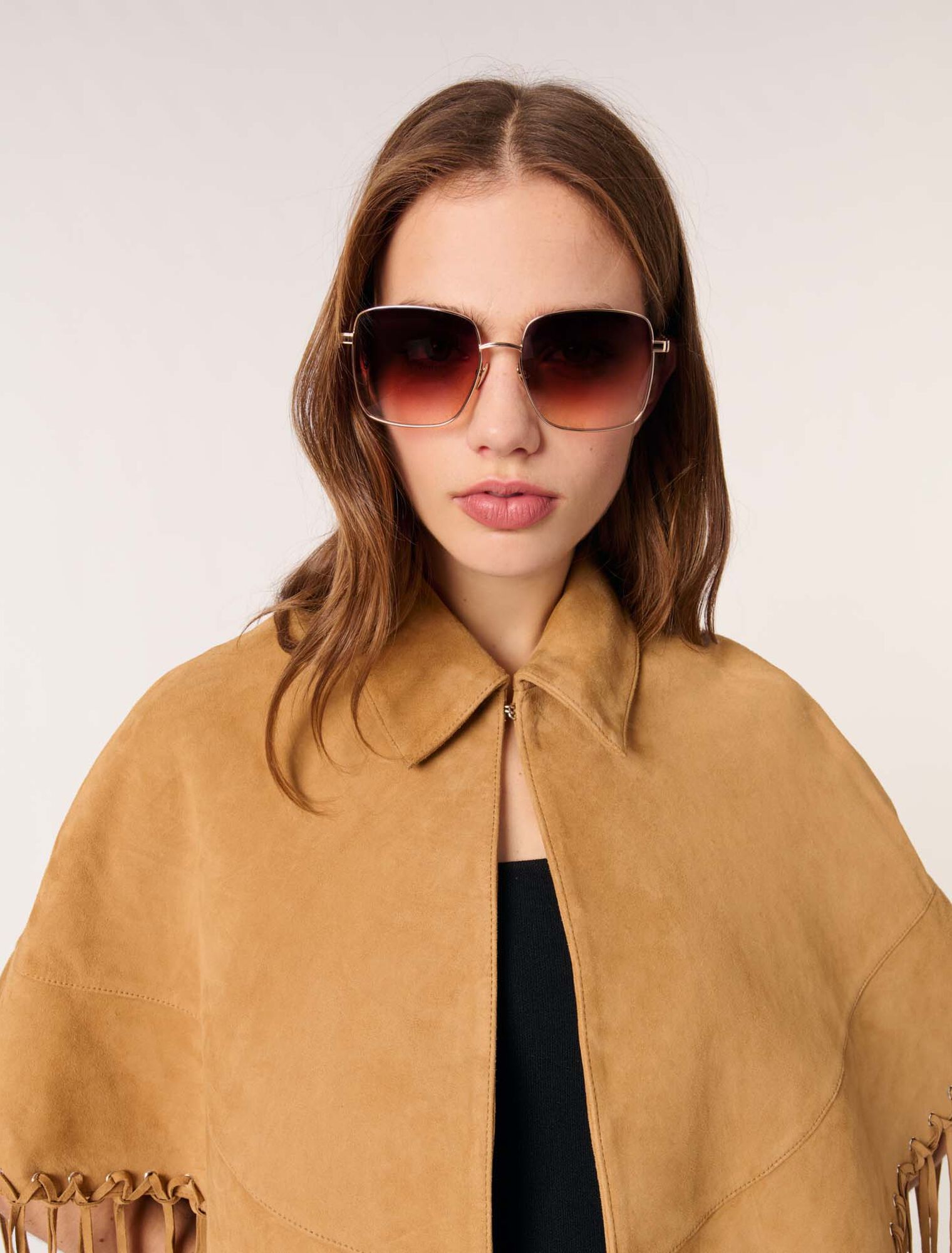 Manteau court à franges en nubuck