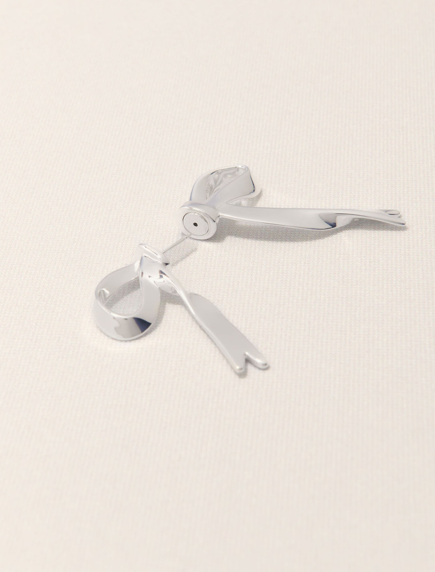 Boucle d'oreille nœud argentée