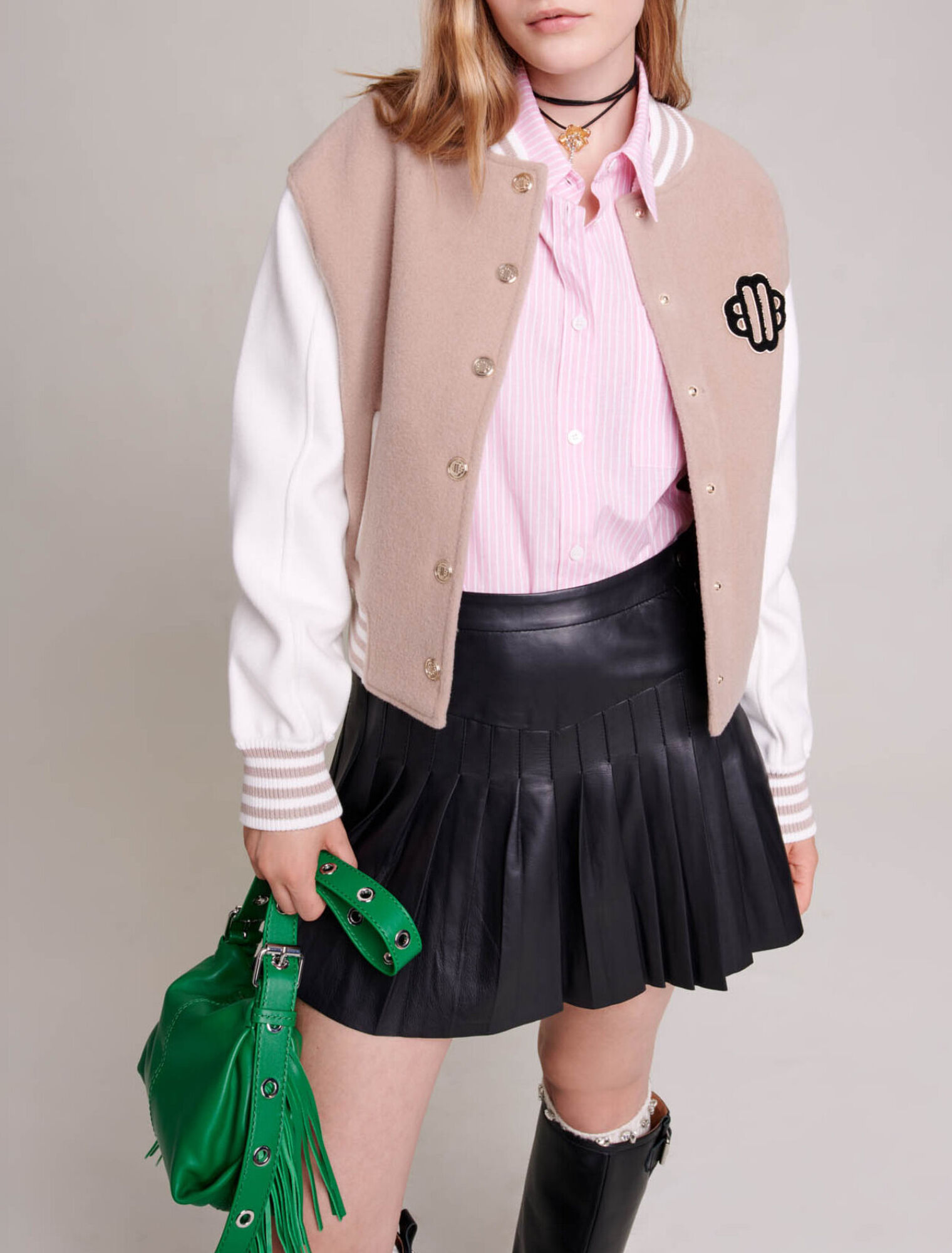 Pleated, flared leather skirt