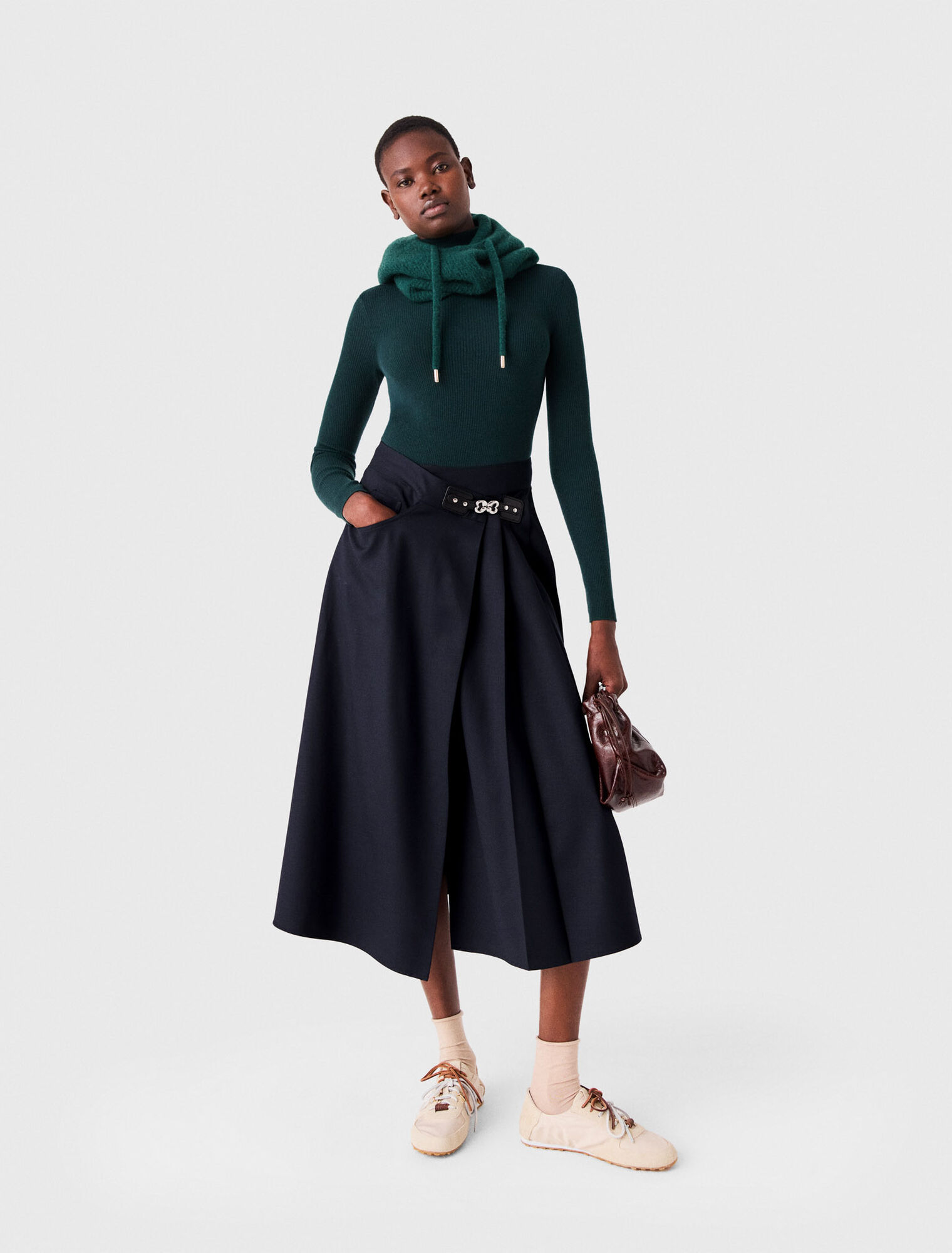 Long pleated skirt with buckle