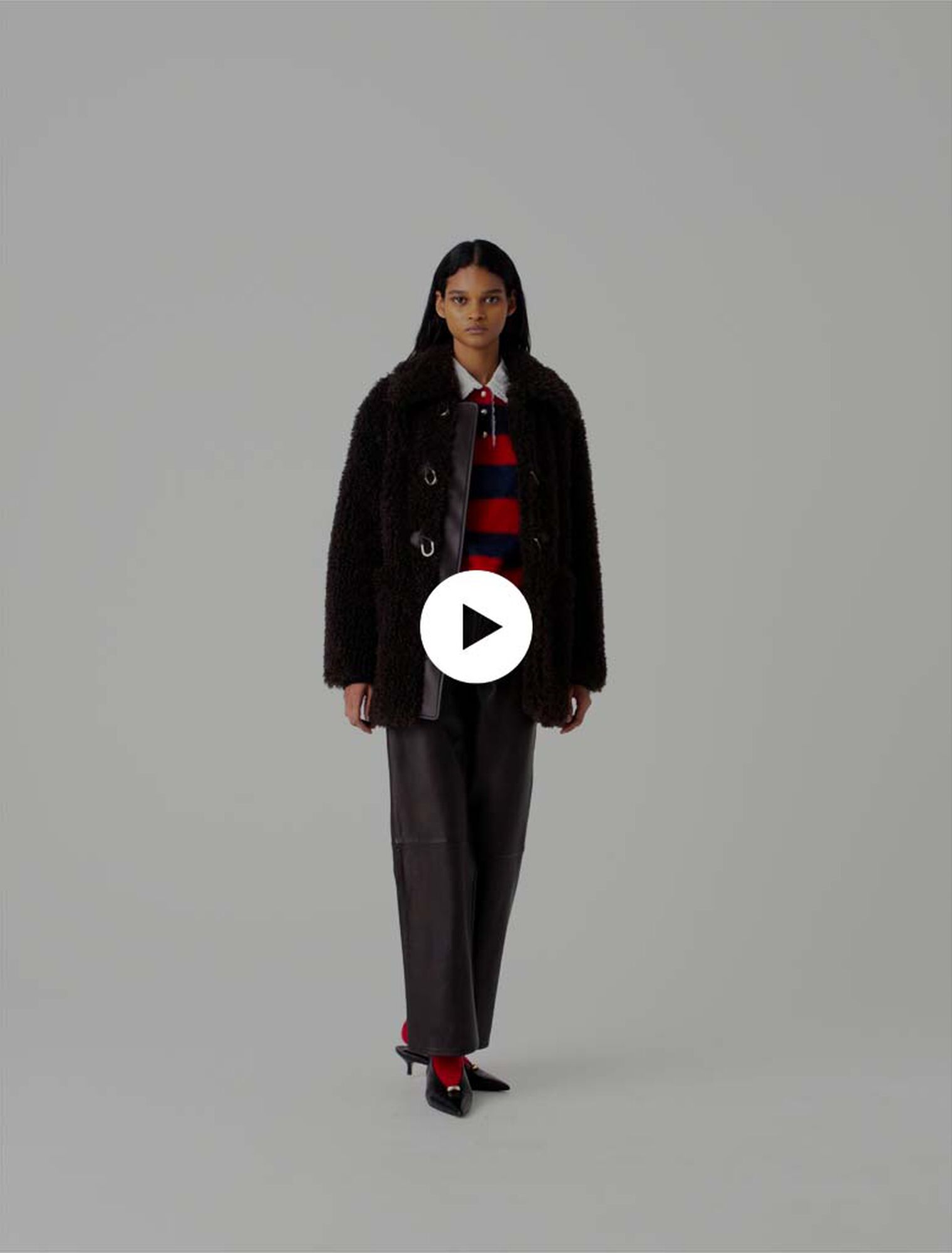 Manteau mi-long en fausse fourrure