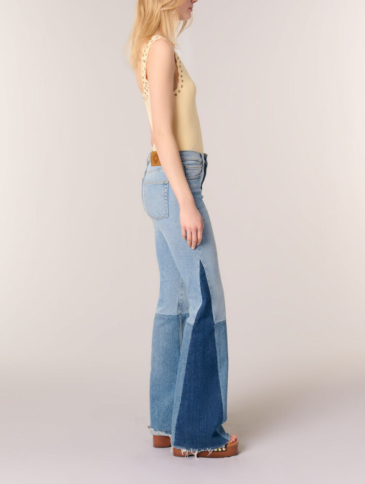Top en maille &agrave; &oelig;illets