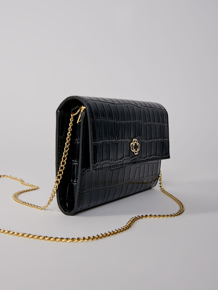 Sac pochette en cuir embossé