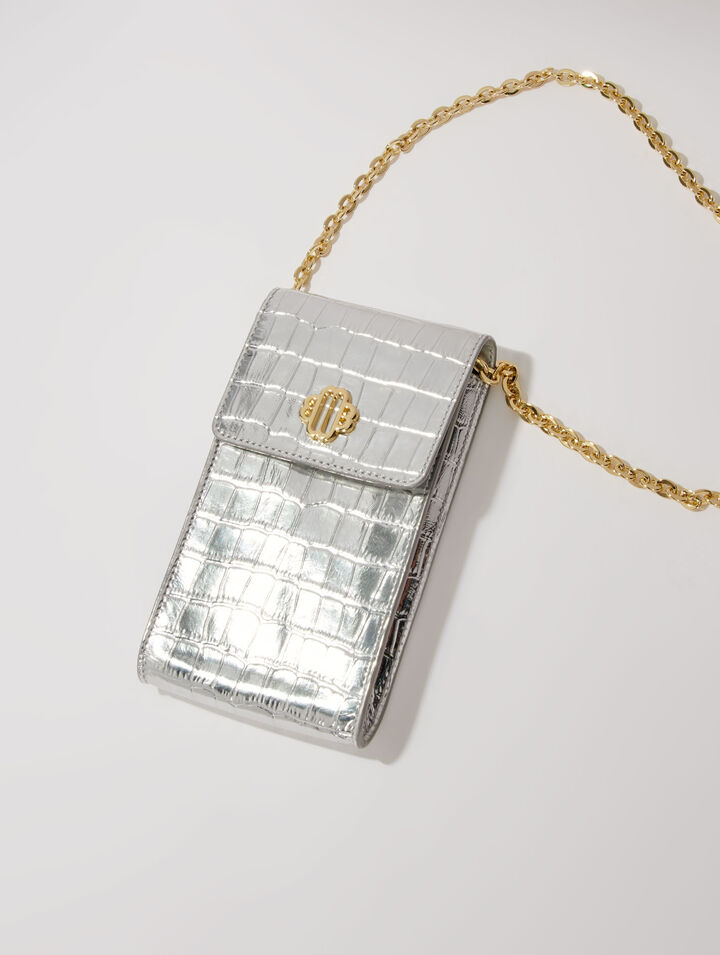 Metallic embossed leather clutch