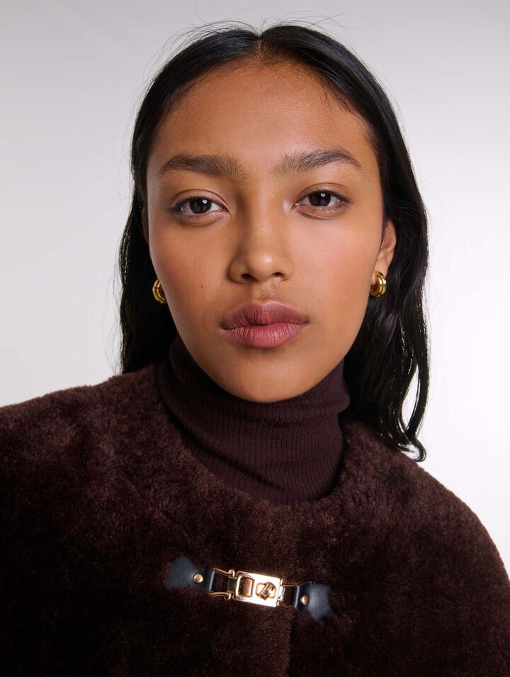 Manteau court en fausse fourrure