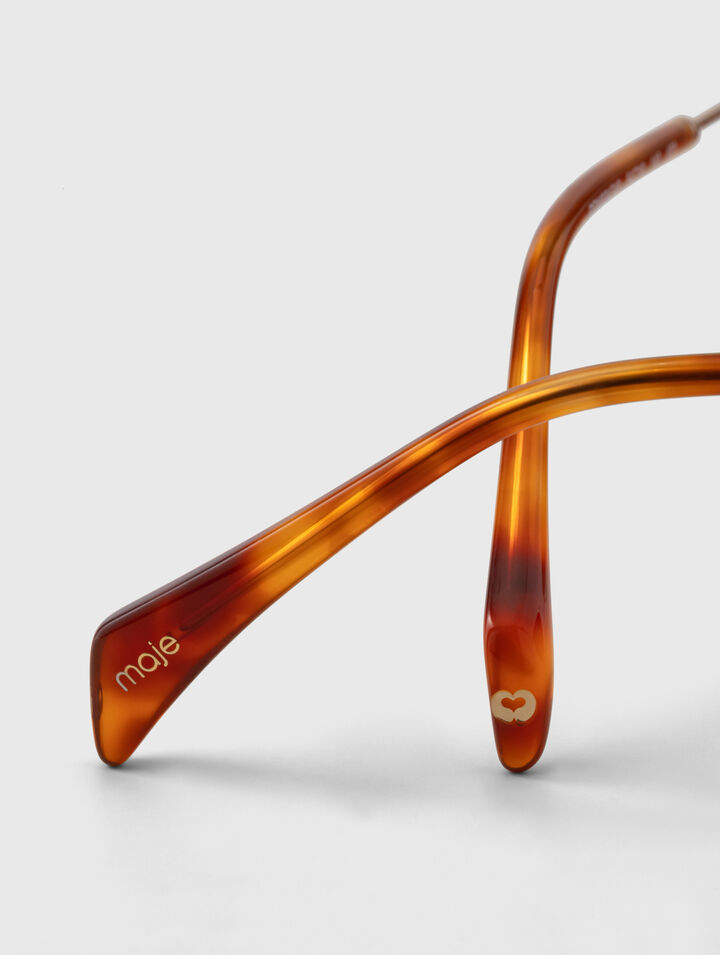 Lunettes ovales facett&eacute;es en m&eacute;tal