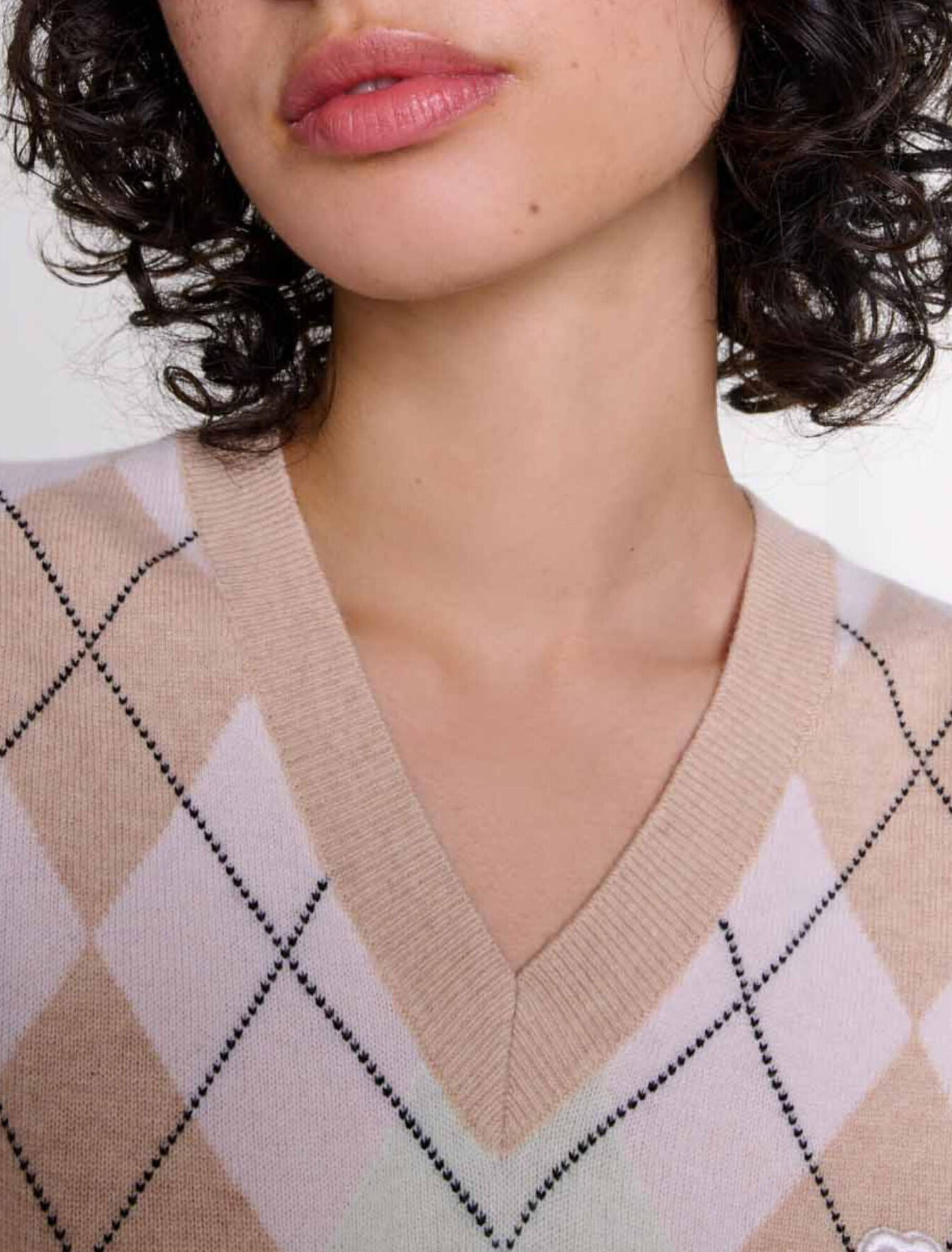 Pull sans manches en laine m&eacute;lang&eacute;e