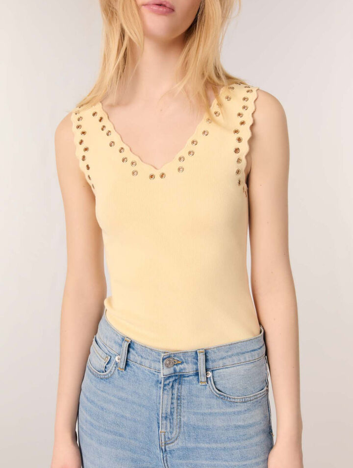 Top en maille &agrave; &oelig;illets