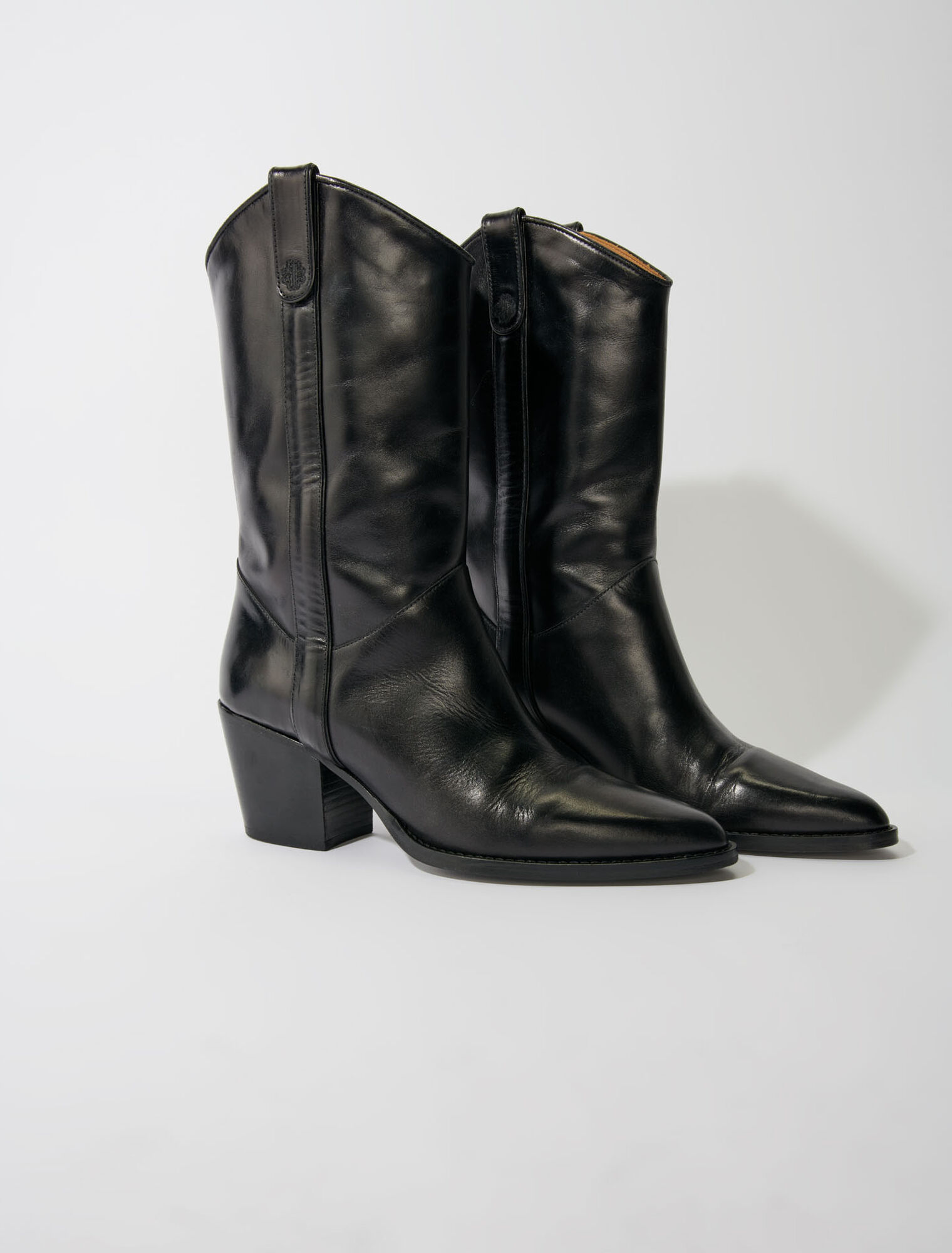 Heeled leather boots