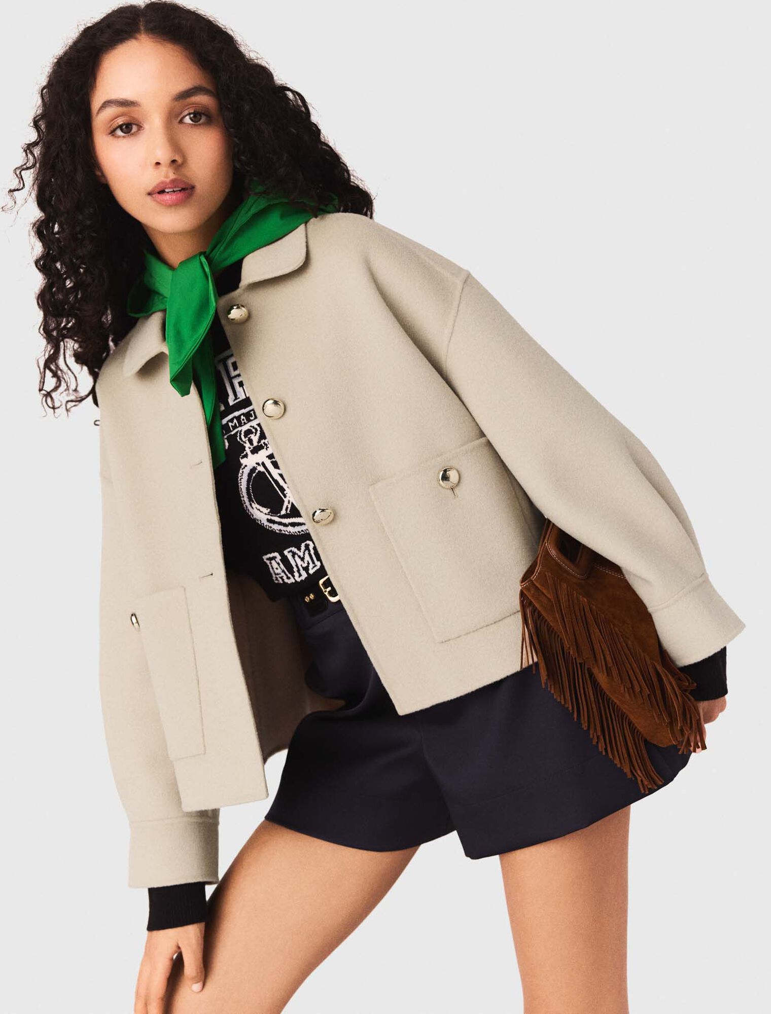 Short pleated-back wool jacket