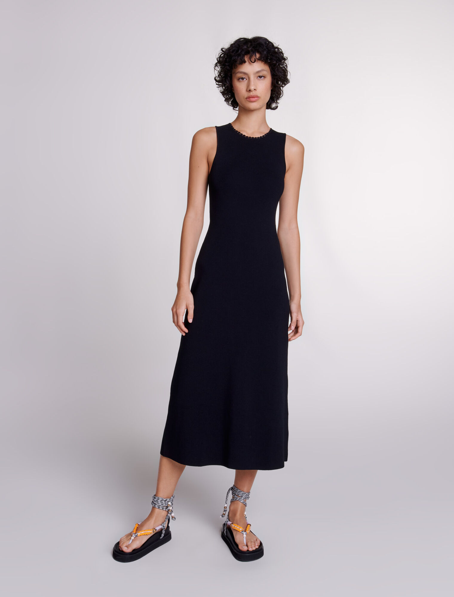 Robe longue en maille à découpes