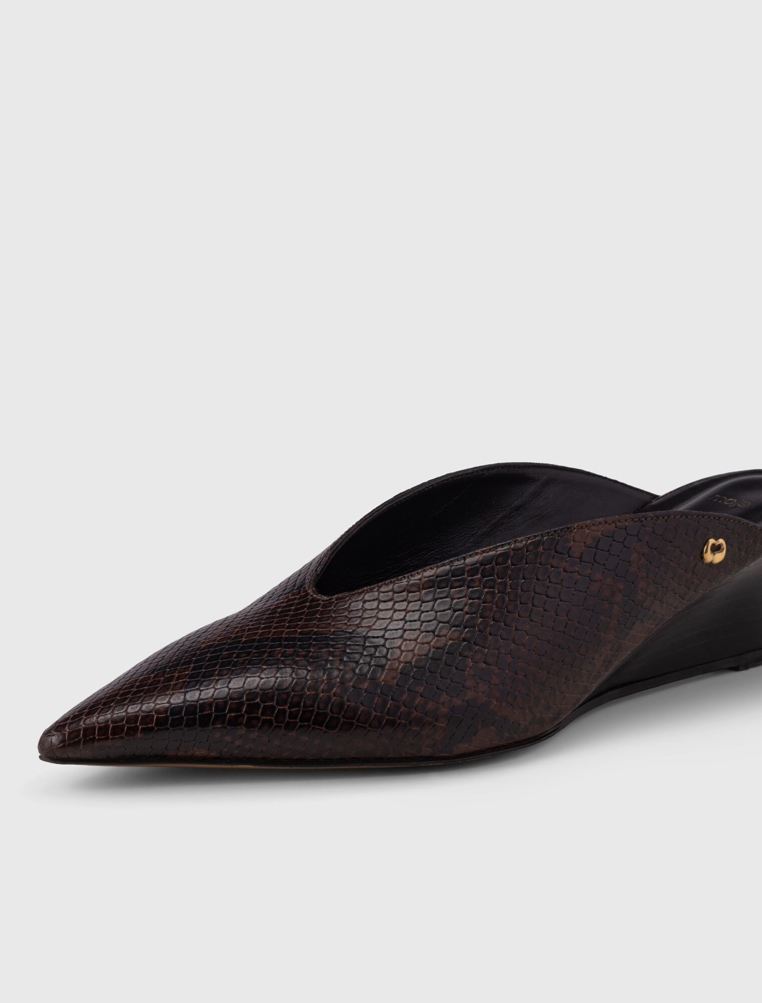 Embossed leather wedge mules